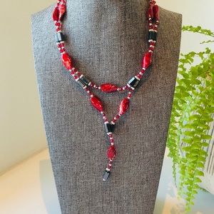Hematite lariat style necklace w/ red enamel beads